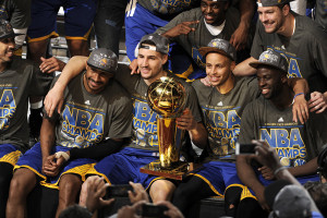 CLEVELAND, OH - JUNE 16: The Golden State Warriors celebrate winning the 2015 NBA Finals after a win against the Cleveland Cavaliers in Game Six of the 2015 NBA Finals at The Quicken Loans Arena on June 16, 2015 in Cleveland, OH. NOTE TO USER: User expressly acknowledges and agrees that, by downloading and/or using this Photograph, user is consenting to the terms and conditions of the Getty Images License Agreement. Mandatory Copyright Notice: Copyright 2015 NBAE (Photo by David Liam Kyle/NBAE via Getty Images)