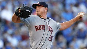 Houston Astros pitcher Scott Kazmir throws in the first inning of a baseball game against the Kansas City Royals in Kansas City, Mo., Friday, July 24, 2015. (AP Photo/Colin E. Braley)
